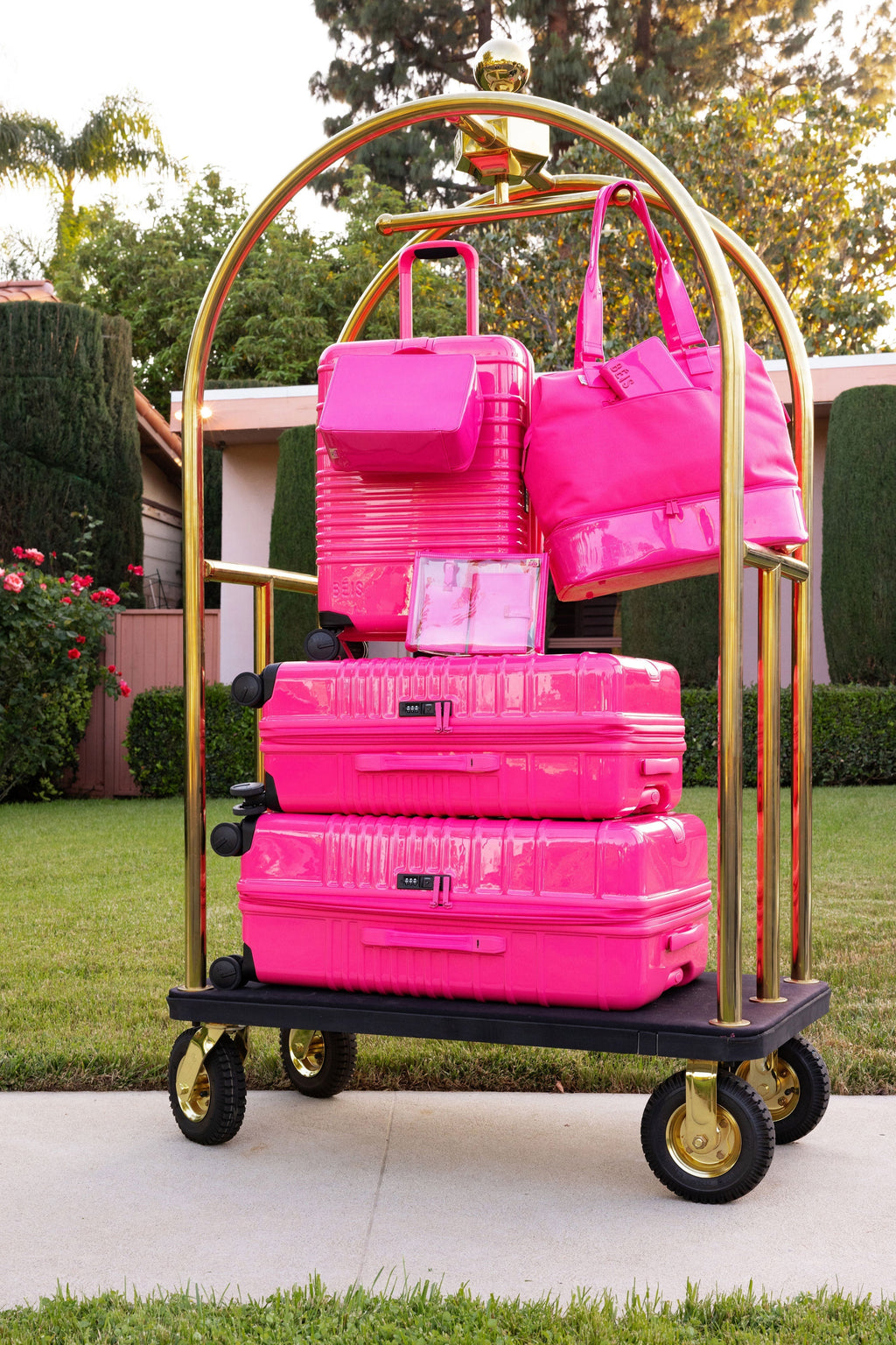 The Medium Check-In Roller in Barbie? Pink